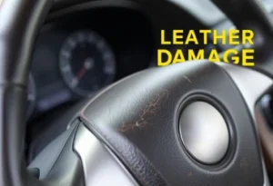 steering wheel repair closeup of cracked leather damage on car steering wheel focusing on visible wear and tear