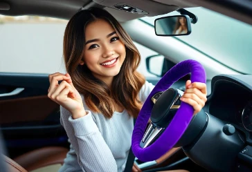 young woman holding purple japanese steering wheel cover inside car showing excitement about new steering wheel cover for her vehicle